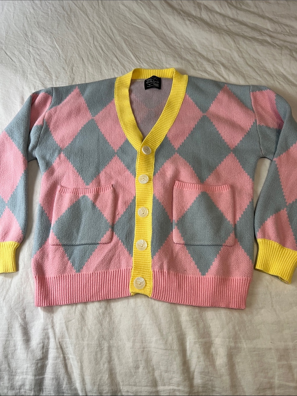 Steady Hands Pink & Light Blue Argyle Cardigan with Yellow Trim